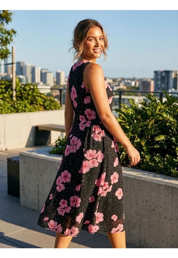 Sinsay - Sukienka midi w kropki z nadrukiem kwiatowym - wielobarwny. Wzór: kropki, nadruk, kwiaty. Długość: midi