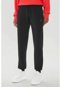 Guess - GUESS Czarne damskie spodnie dresowe Olympe, Rozmiar S. Kolor: czarny. Materiał: dresówka #1