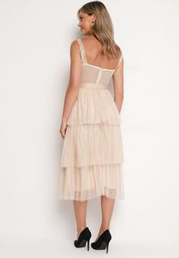 Born2be - Beżowa Sukienka Koktajlowa z Gorsetową Górą Falbanami Cekinami i Kokardą Loralina. Typ kołnierza: kokarda, dekolt gorset. Kolor: beżowy. Długość rękawa: na ramiączkach. Wzór: aplikacja. Typ sukienki: gorsetowe. Styl: wizytowy #7