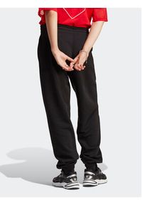 Adidas - adidas Spodnie dresowe Essentials Fleece IA6437 Czarny Regular Fit. Kolor: czarny. Materiał: bawełna #3