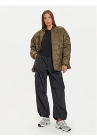 New Balance Spodnie dresowe WP43534 Czarny Relaxed Fit. Kolor: czarny. Materiał: syntetyk #2