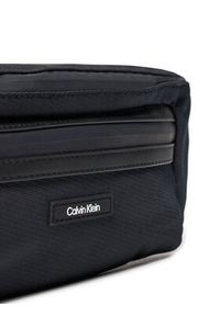 Calvin Klein Saszetka nerka Essential K50K512229 Czarny. Kolor: czarny. Materiał: materiał