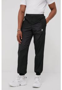 adidas Originals spodnie męskie kolor czarny. Kolor: czarny. Materiał: materiał, tkanina