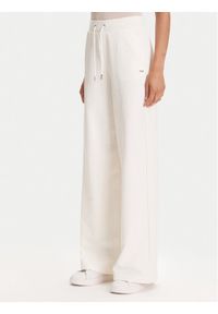 Guess Spodnie dresowe V5YB19 KBSL2 Écru Regular Fit. Materiał: syntetyk