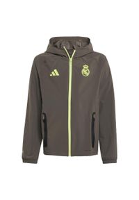 Adidas - Kurtka Real Madrid Tiro 25 Competition Vis Tech Travel Jacket Kids. Kolor: szary, wielokolorowy, żółty. Materiał: dresówka. Sport: piłka nożna