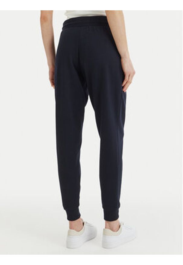 TOMMY HILFIGER - Tommy Hilfiger Spodnie dresowe UW0UW04522 Granatowy Regular Fit. Kolor: niebieski. Materiał: bawełna
