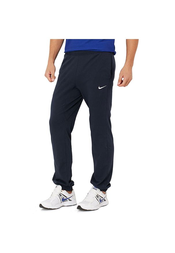 Spodnie Dresowe Sportowe Męskie Nike Bawełniane Regular. Kolor: niebieski. Materiał: dresówka, bawełna. Sport: fitness