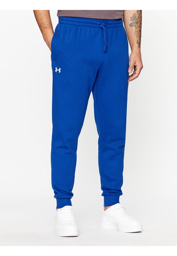 Under Armour Spodnie dresowe Ua Rival Fleece Joggers 1379774 Niebieski Loose Fit. Kolor: niebieski. Materiał: bawełna