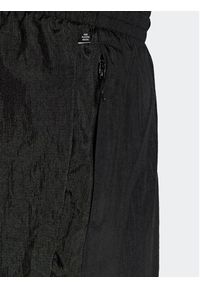 Adidas - adidas Spodnie dresowe Reveal Material Mix HK2732 Czarny Regular Fit. Kolor: czarny. Materiał: dresówka, syntetyk #4