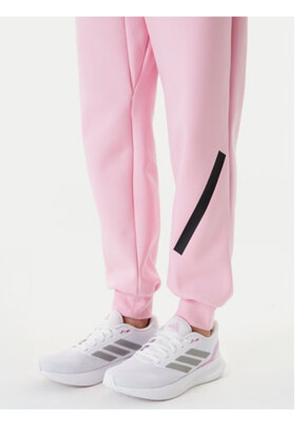 Adidas - adidas Spodnie dresowe Z.N.E. JC5405 Różowy Regular Fit. Kolor: różowy. Materiał: bawełna