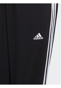 Adidas - adidas Spodnie dresowe Essentials 3-Stripes Woven Tracksuit Bottoms HR6334 Czarny Slim Fit. Kolor: czarny. Materiał: syntetyk #3