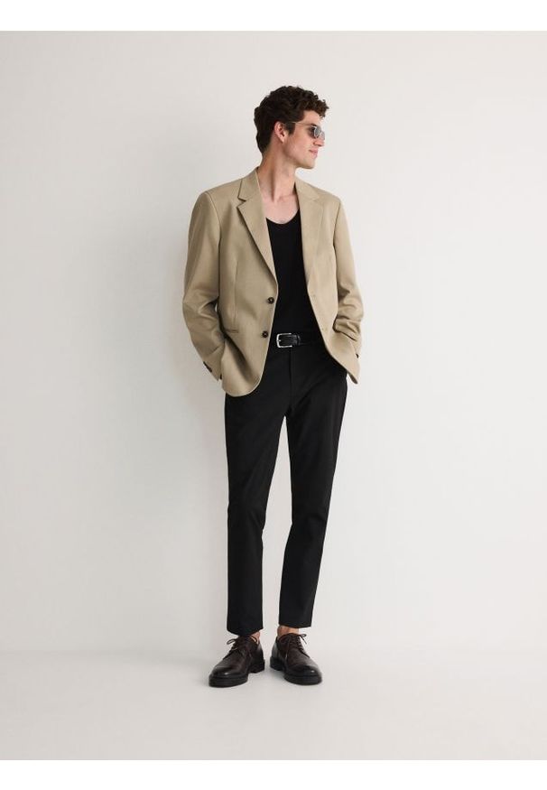 Reserved - Spodnie slim fit - czarny. Kolor: czarny. Materiał: tkanina, wiskoza