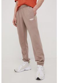 adidas Originals spodnie dresowe bawełniane HC9461 męskie kolor beżowy gładkie. Kolor: beżowy. Materiał: bawełna, dresówka. Wzór: gładki #1