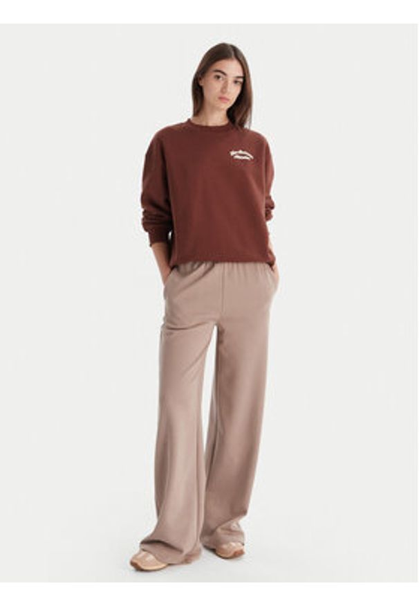 New Balance Bluza WT53516 Brązowy Relaxed Fit. Kolor: brązowy. Materiał: syntetyk, bawełna