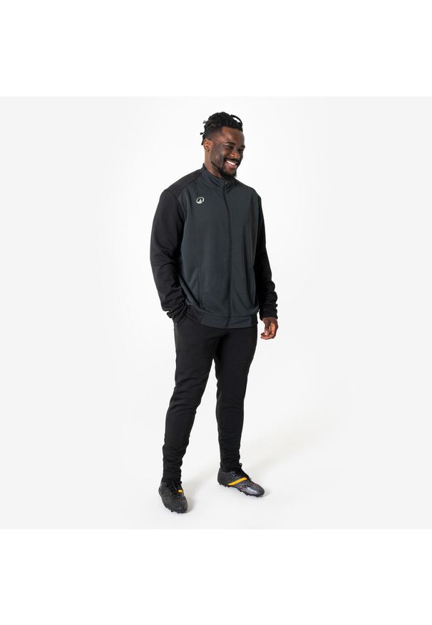 KIPSTA - Bluza piłkarska Kipsta Essential treningowa. Typ kołnierza: komin. Kolor: wielokolorowy, czarny, szary. Materiał: tkanina, elastan, prążkowany, materiał, poliester. Sport: piłka nożna