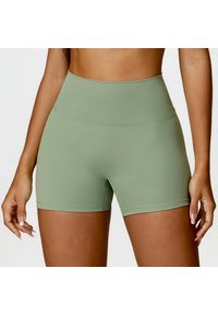 Intica - Spodenki sportowe modelujące z elastycznym pasem do treningu i biegania Essence. Kolor: zielony. Materiał: materiał. Sport: fitness