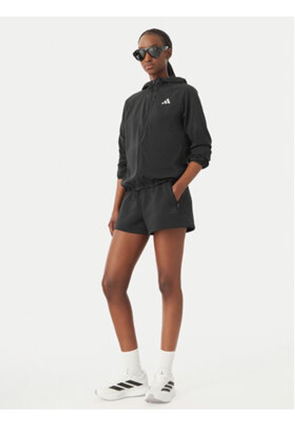 Adidas - adidas Kurtka do biegania Essentials KA4339 Czarny Regular Fit. Kolor: czarny. Materiał: syntetyk