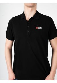 Diesel Koszulka Polo "T-Weet" | A00418-RBAWH-900 | Mężczyzna | Czarny. Okazja: na co dzień, na spotkanie biznesowe. Typ kołnierza: polo. Kolor: czarny. Materiał: bawełna. Długość rękawa: krótki rękaw. Długość: krótkie. Wzór: nadruk. Styl: casual, biznesowy, elegancki #5