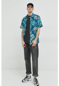 Volcom koszula męska kolor niebieski regular z kołnierzykiem klasycznym. Typ kołnierza: kołnierzyk klasyczny. Kolor: niebieski. Materiał: tkanina. Długość rękawa: krótki rękaw. Długość: krótkie. Styl: klasyczny #4