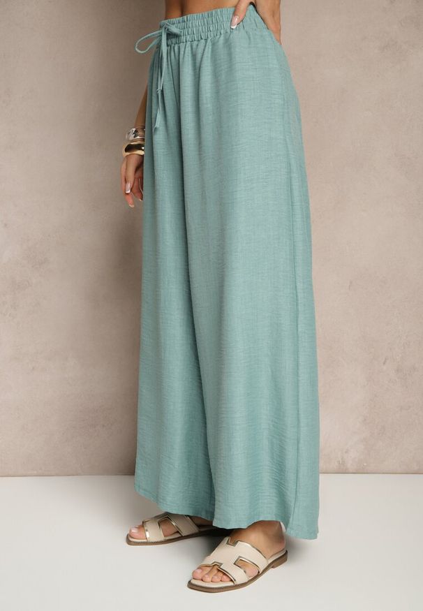 Renee - Miętowe Szerokie Spodnie High Waist Ozdobione Wiązaniem Telonia. Okazja: na co dzień. Stan: podwyższony. Kolor: zielony. Wzór: aplikacja. Styl: casual, elegancki