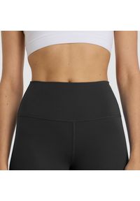 Spodenki damskie New Balance WS51114BK – czarne. Stan: podwyższony. Kolor: czarny. Materiał: tkanina, lycra, poliester, materiał #2