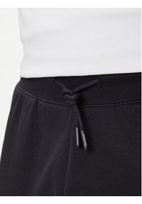 The North Face Spodnie dresowe Essential NF0A8C1F Czarny Relaxed Fit. Kolor: czarny. Materiał: bawełna #5