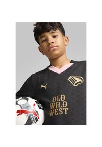 Puma - Młodzieżowa koszulka wyjazdowa Palermo F.C. 24/25 PUMA Black Gold. Kolor: żółty, wielokolorowy, czarny. Materiał: materiał