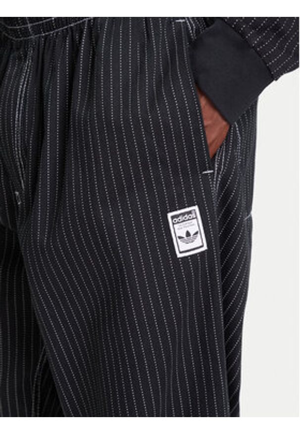 Adidas - adidas Spodnie dresowe Wabash JP4489 Czarny Loose Fit. Kolor: czarny. Materiał: bawełna