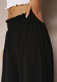 Renee - Czarne Spodnie High Waist z Szerokimi Nogawkami i Gumką w Pasie Risabessa. Okazja: na co dzień. Stan: podwyższony. Kolor: czarny. Styl: elegancki, casual #4