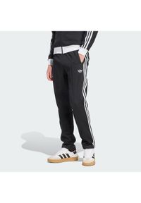 Adidas - adidas Spodnie dresowe Classic KE3530 Czarny Slim Fit. Kolor: czarny. Materiał: bawełna #1