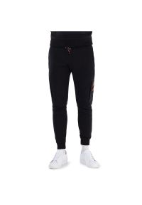 Adidas - Spodnie adidas Essentials Brandlove Fleece HL9375 - czarne. Kolor: czarny. Materiał: poliester, materiał, dresówka, bawełna