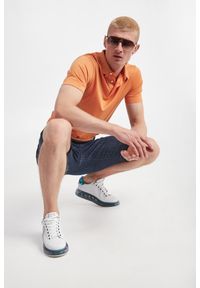 Emporio Armani - Polo męskie EMPORIO ARMANI. Typ kołnierza: polo