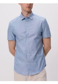 Reserved - Bawełniana koszula slim fit - jasnoniebieski. Kolor: niebieski. Materiał: bawełna