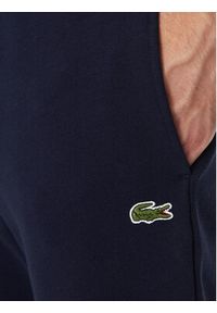 Lacoste Spodnie dresowe XH9624 Granatowy Regular Fit. Kolor: niebieski. Materiał: bawełna #4