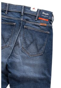 Wrangler - WRANGLER HIGH SKINNY FOZEN BLUE W27HX782Z. Stan: podwyższony