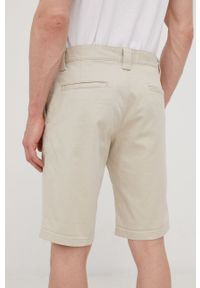 Tommy Jeans szorty SCANTON męskie kolor beżowy. Kolor: beżowy. Materiał: tkanina, materiał. Wzór: gładki