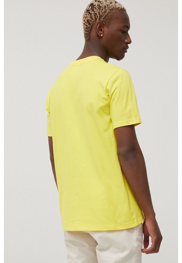 Champion t-shirt bawełniany CHAMPION X SMILEY kolor żółty z aplikacją. Kolor: żółty. Materiał: bawełna. Wzór: aplikacja