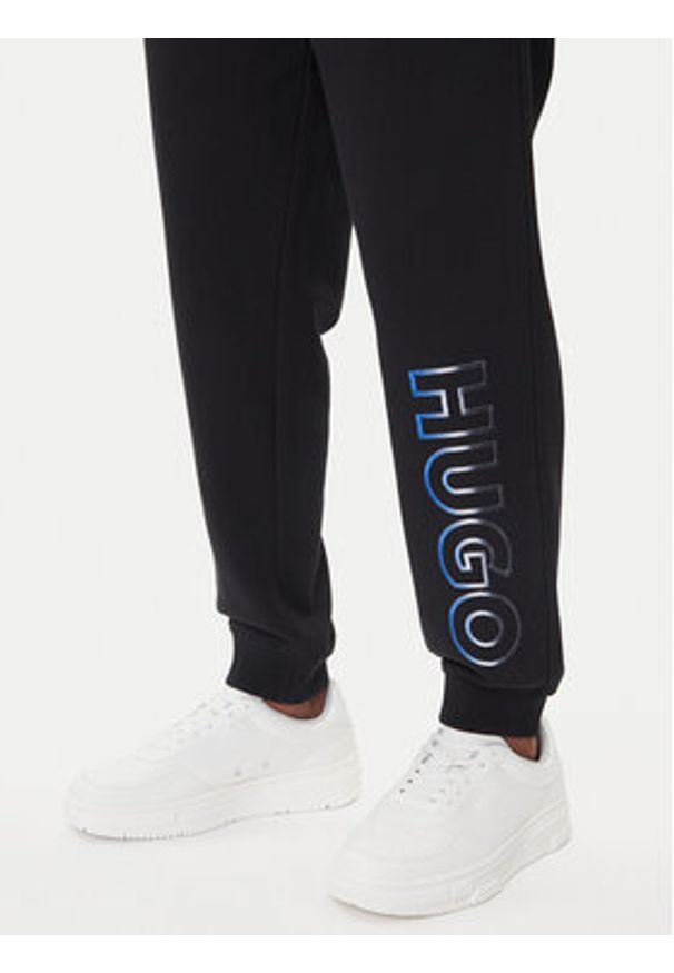 Hugo - HUGO Spodnie dresowe Nogtro 50549149 Czarny Regular Fit. Kolor: czarny. Materiał: bawełna