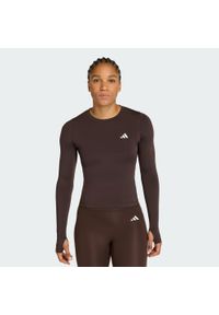 Adidas - Koszulka Power Essentials Workout Contour Long Sleeve. Kolor: brązowy. Długość rękawa: długi rękaw. Technologia: ClimaCool (Adidas). Długość: długie. Sport: fitness #1