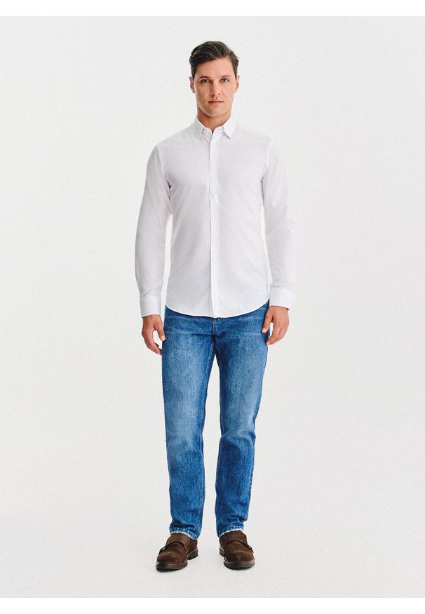 Pako Lorente - PAKO LORENTE – Biała bawełniana koszula męska. Kolor: niebieski, biały, czarny. Materiał: bawełna. Długość rękawa: długi rękaw. Długość: długie. Wzór: gładki