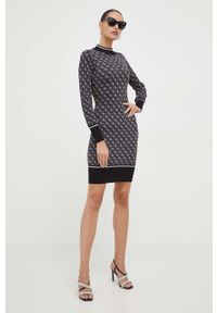 Guess sukienka kolor czarny mini dopasowana. Kolor: czarny. Materiał: dzianina. Długość rękawa: długi rękaw. Typ sukienki: dopasowane. Długość: mini #4