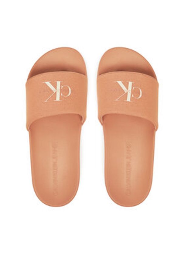 Calvin Klein Jeans Klapki Slide Monogram Wn YW0YW01835 Koralowy. Kolor: pomarańczowy. Materiał: materiał