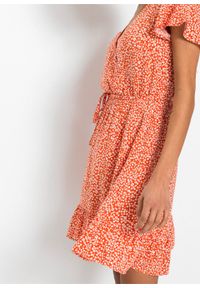 Sukienka LENZING™ ECOVERO™ bonprix czerwono-pomarańczowy w kwiaty. Typ kołnierza: dekolt w serek. Kolor: pomarańczowy. Wzór: kwiaty. Długość: mini #3