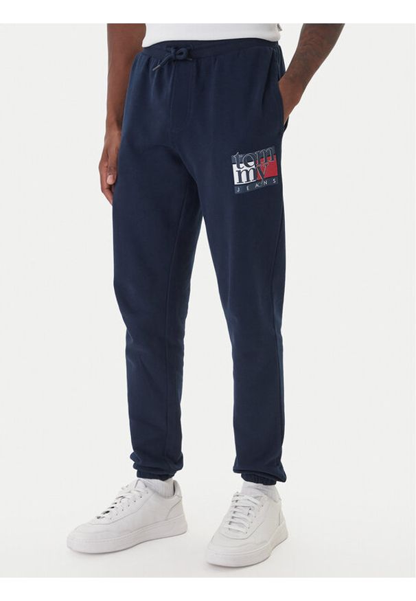Tommy Jeans Spodnie dresowe DM0DM22094 Granatowy Relaxed Fit. Kolor: niebieski. Materiał: bawełna