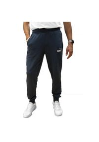 Puma - Spodnie Do Joggingu Męskie Logo ESS. Kolor: niebieski. Materiał: dresówka. Sport: bieganie