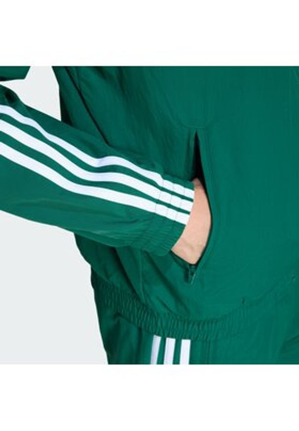 Adidas - adidas Bluza Firebird KC8018 Zielony Regular Fit. Kolor: zielony. Materiał: syntetyk