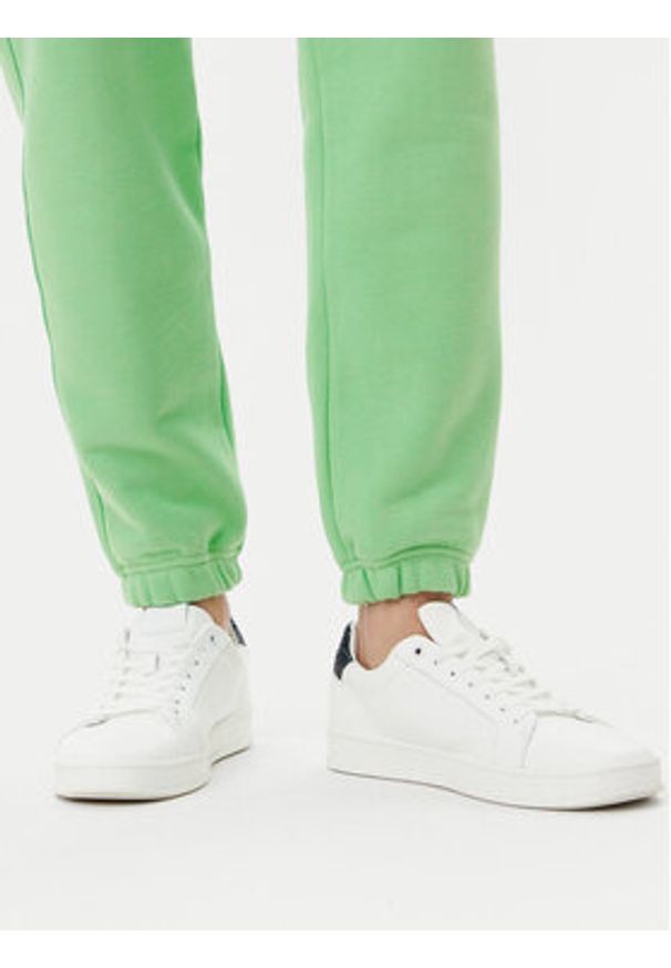 Lacoste Spodnie dresowe XH2750 Zielony Relaxed Fit. Kolor: zielony. Materiał: bawełna