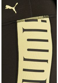 Puma Spodnie 520259 damskie kolor czarny z nadrukiem. Kolor: czarny. Materiał: dzianina. Wzór: nadruk #2