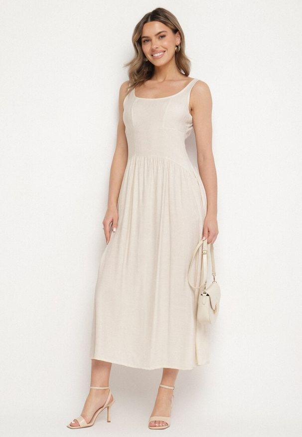 Born2be - Beżowa Wiskozowa Sukienka o Rozkloszowanym Kroju Milareina. Okazja: na co dzień. Kolor: beżowy. Materiał: wiskoza. Długość rękawa: długi rękaw. Wzór: aplikacja. Typ sukienki: rozkloszowane. Styl: casual, elegancki