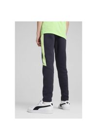 Puma - Młodzieżowe spodnie Evostripe PUMA New Navy Blue. Kolor: niebieski